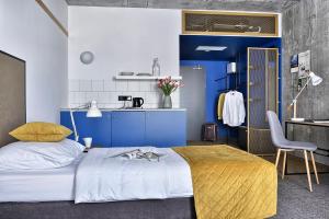 Postel nebo postele na pokoji v ubytování Hotel Arche Geologiczna