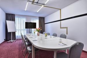 TV a/nebo společenská místnost v ubytování Hotel Arche Geologiczna