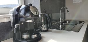 Cuisine ou kitchenette dans l'établissement Vue sur Meuse