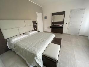 Postel nebo postele na pokoji v ubytování B&B Bertani