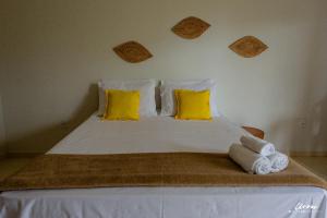 Ένα ή περισσότερα κρεβάτια σε δωμάτιο στο Pousada Quinta do Patacho +44 φωτογραφίες