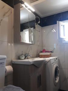 Kúpeľňa v ubytovaní Caldera Premium Villa