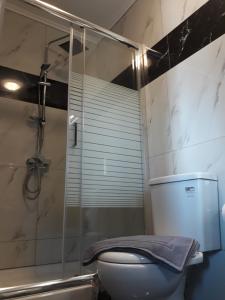 Kúpeľňa v ubytovaní Caldera Premium Villa