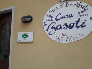 Certifikát, hodnocení, plakát nebo jiný dokument vystavený v ubytování B&B Casabasoti