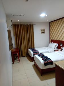 Postel nebo postele na pokoji v ubytování seven7days hotel