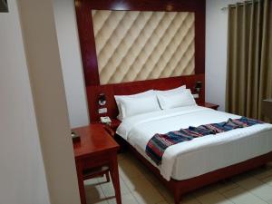 Postel nebo postele na pokoji v ubytování seven7days hotel