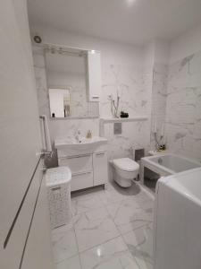 Kúpeľňa v ubytovaní Apartmani Pina 1 + 24 fotografií