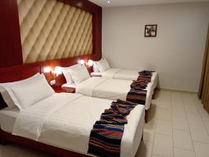 Postel nebo postele na pokoji v ubytování seven7days hotel