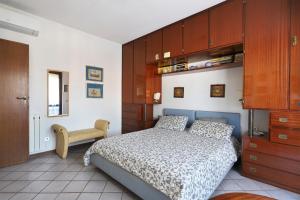 Łóżko lub łóżka w pokoju w obiekcie Villa Mirella, 100 metri dal Mare