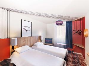 Postel nebo postele na pokoji v ubytování ibis Styles Toulouse Lavaur + 37 fotografií