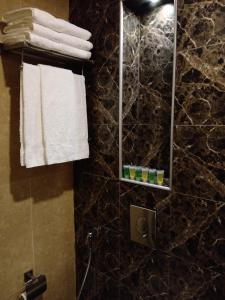 Kylpyhuone majoituspaikassa seven7days hotel