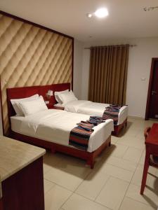 Postel nebo postele na pokoji v ubytování seven7days hotel