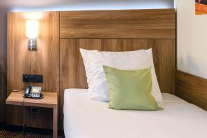 Postel nebo postele na pokoji v ubytování Hotel Opera Antwerpen Centrum