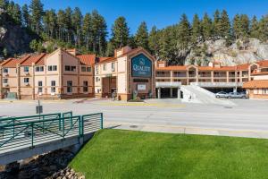 a large building with a skate park in front of it at Quality Inn Keystone near Mount Rushmore in Keystone