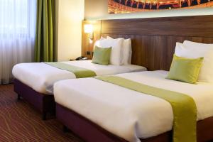 Postel nebo postele na pokoji v ubytování Hotel Opera Antwerpen Centrum