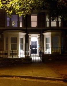 a large white house with the front door open at Newcastle Treasure - sleeps 4 in Newcastle upon Tyne