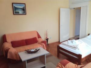 Postel nebo postele na pokoji v ubytování Dora Apartment