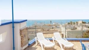 En balkong eller terrasse på Riflesso sul mare