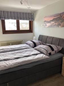 Postel nebo postele na pokoji v ubytování Haus Trude