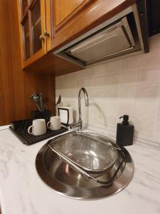 A kitchen or kitchenette at FraBa Apartment