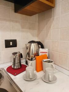 Coffee and tea making facilities at FraBa Apartment