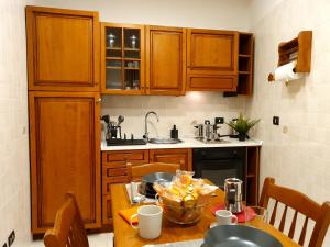 A kitchen or kitchenette at FraBa Apartment