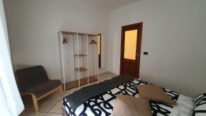 A bed or beds in a room at FraBa Apartment