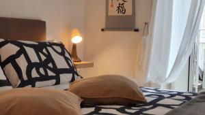 A bed or beds in a room at FraBa Apartment