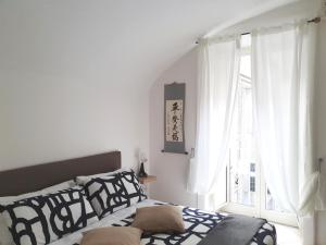 A bed or beds in a room at FraBa Apartment