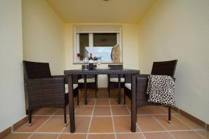 Posedenie v ubytovaní Apartamento primera línea de playa Isla Cristina Urbanización Zarati
