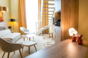 โทรทัศน์และ/หรือระบบความบันเทิงของ Holiday Inn Reims Centre by IHG