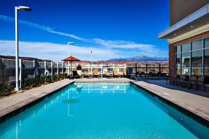 a swimming pool on the roof of a building at Holiday Inn St. George Convention Center, an IHG Hotel in St. George