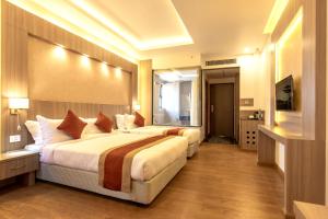 Letto o letti in una camera di Landmark Kathmandu