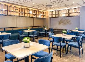 Restoran ili drugo mesto za obedovanje u objektu Metropolo Jingjiang Hotels- JiangNan market ShuangLong
