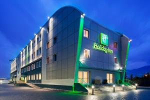 a large building with a hospital sign on it at Holiday Inn Salerno-Cava De' Tirreni, an IHG Hotel in Cava deʼ Tirreni