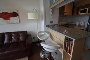Eldhús eða eldhúskrókur á Alto Sporting Apartments