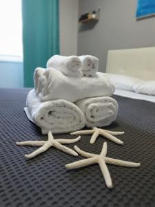 Postel nebo postele na pokoji v ubytování Solfatara Suites B&B