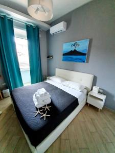 Postel nebo postele na pokoji v ubytování Solfatara Suites B&B