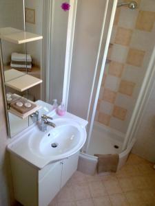 Koupelna v ubytování Marko Rooms