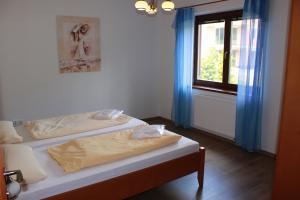 Postel nebo postele na pokoji v ubytování Holiday House - Blue Antik 101 Lipno Home