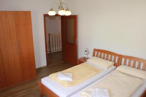 Postel nebo postele na pokoji v ubytování Holiday House - Blue Antik 101 Lipno Home