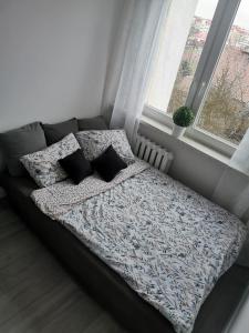 Giường trong phòng chung tại Air Flat Gliwice