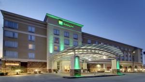 a hotel with a sign on the front of it at Holiday Inn Meridian East I 59 / I 20 in Meridian