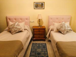 A bed or beds in a room at Like Home
