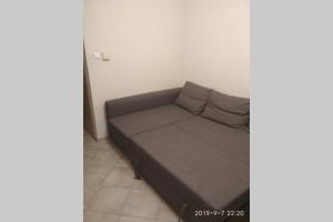 a bed in a small room with at Fanari Maisonette in Fanari