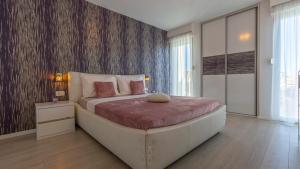 Ένα ή περισσότερα κρεβάτια σε δωμάτιο στο Apartment Split