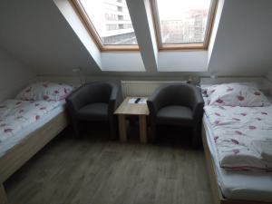 Posteľ alebo postele v izbe v ubytovaní Penzion MAR