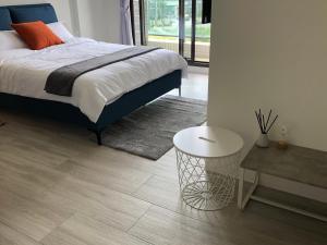 Postel nebo postele na pokoji v ubytování 單眼皮民宿 Single Eyelid Hostel