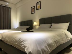 Postel nebo postele na pokoji v ubytování 單眼皮民宿 Single Eyelid Hostel