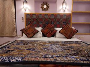 Letto o letti in una camera di Shanti Home